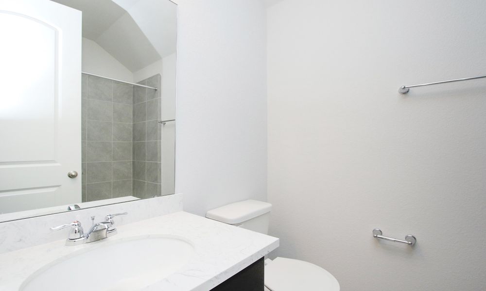 Representative furnished interior of a home built from the Enclave Series - Fiji by DRB Homes in Meyer Ranch – Premier, New Braunfels (Image 24).