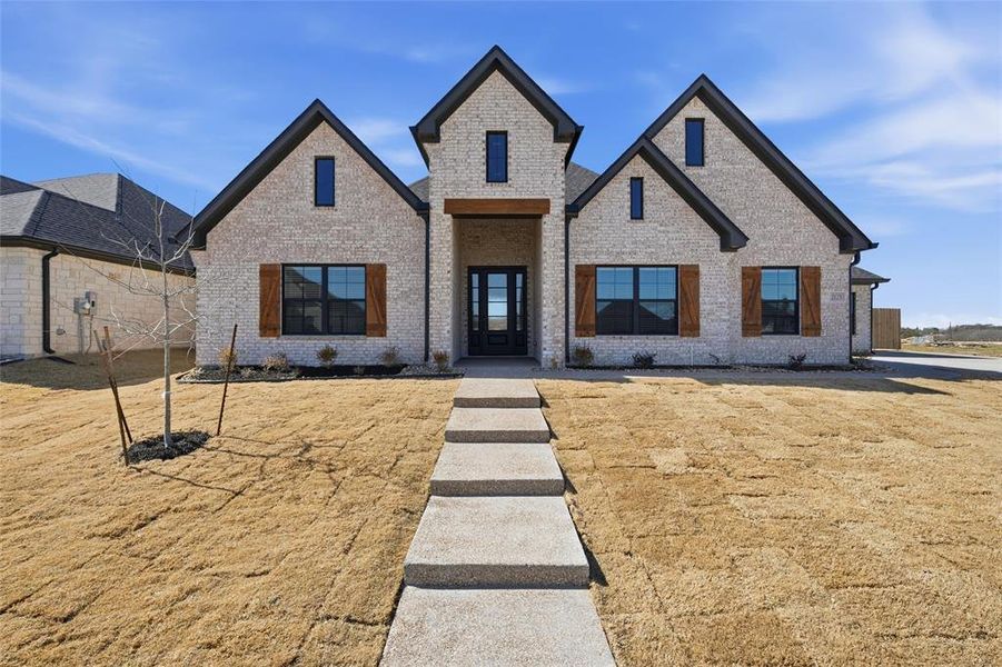Front exterior of a new home in , Lorena, TX, highlighting curb appeal (Image 1). Front exterior of a new home in , Lorena, TX, highlighting curb appeal (Image 1).