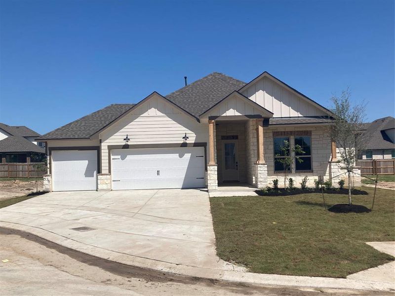 Front exterior of a new home in Wellborn Settlement, College Station, TX, highlighting curb appeal (Image 1). Front exterior of a new home in Wellborn Settlement, College Station, TX, highlighting curb appeal (Image 1).