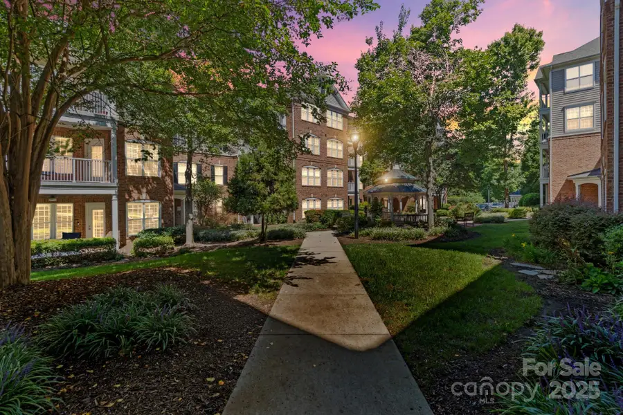 Front exterior of a new home in , Charlotte, NC, highlighting curb appeal (Image 1).