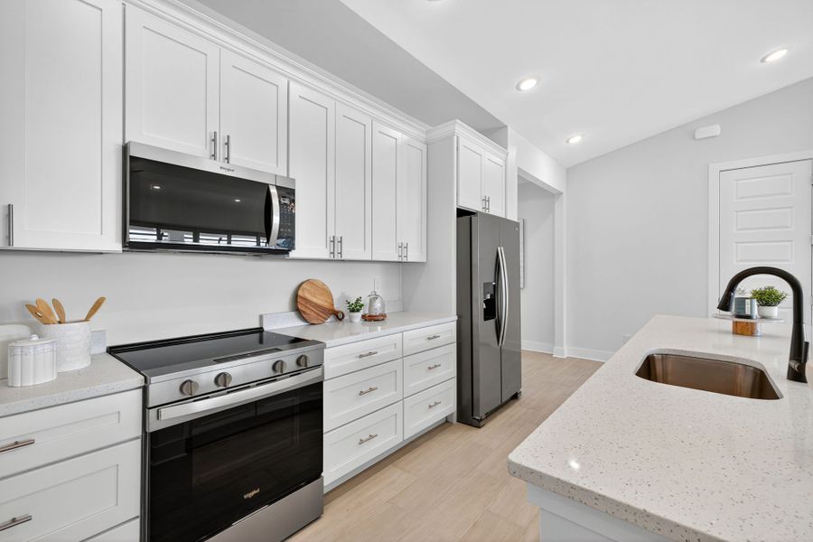 Representative furnished interior of a home built from the The Coral Haven by Sunlife Homes LLC in Cape Coral, Cape Coral (Image 16).