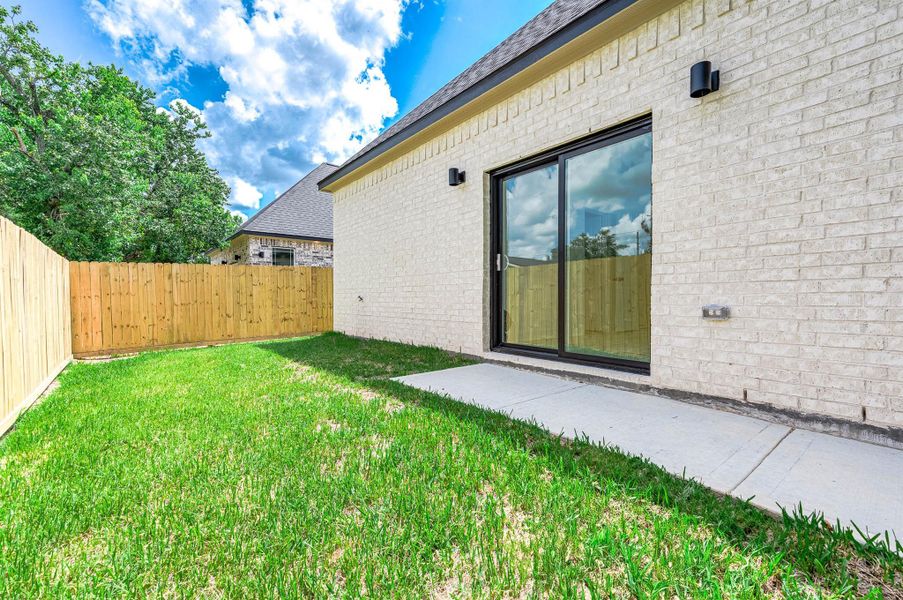 Exterior details and patio area of a home in , Needville (Image 26).