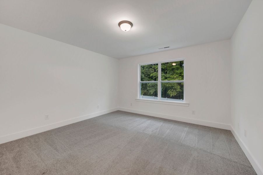 Spacious, unfurnished interior of a new home in Ashmore Townes, Garner (Image 28). Spacious, unfurnished interior of a new home in Ashmore Townes, Garner (Image 28).