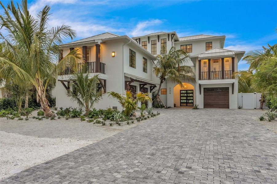Front exterior of a new home in , Anna Maria, FL, highlighting curb appeal (Image 28).