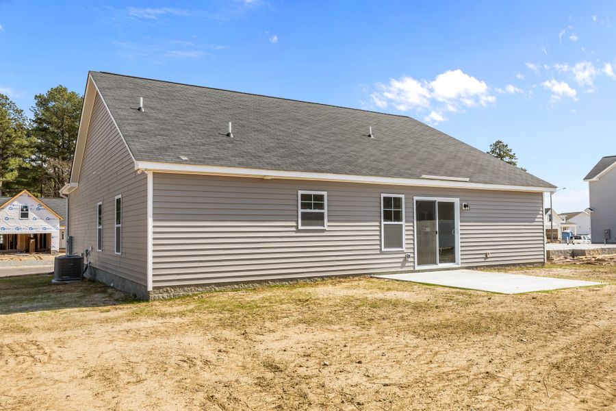 Exterior details and patio area of a home in Davenport Farms, Winterville (Image 22).