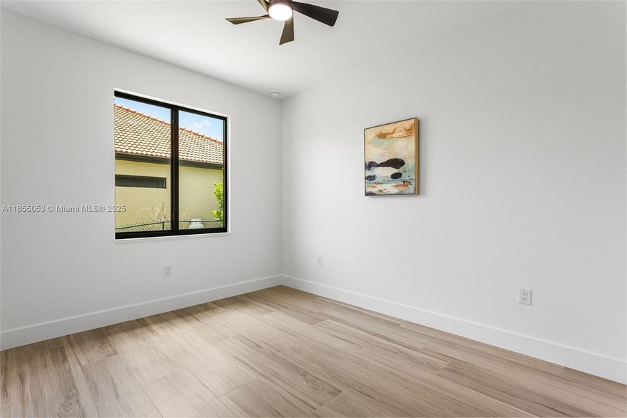 3rd Bedroom - One is located at the rear of the home, next to a POOL BATHROOM, while the other two are at the front, sharing a bathroom in hallway between them. 3rd Bedroom - One is located at the rear of the home, next to a POOL BATHROOM, while the other two are at the front, sharing a bathroom in hallway between them.