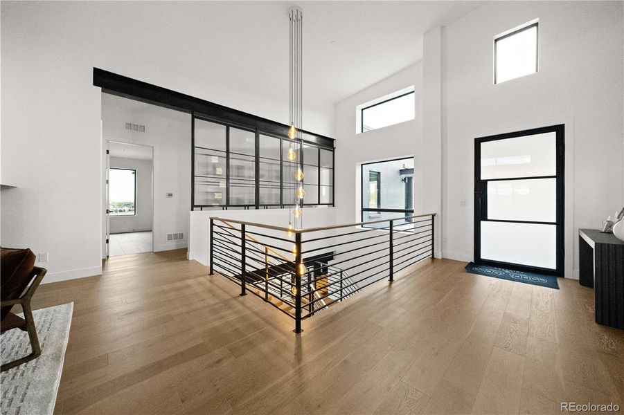 Spacious, unfurnished interior of a new home in Signature at Crystal Valley, Castle Rock (Image 19).