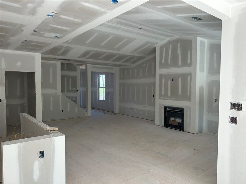 This spacious interior features a prominent firepl