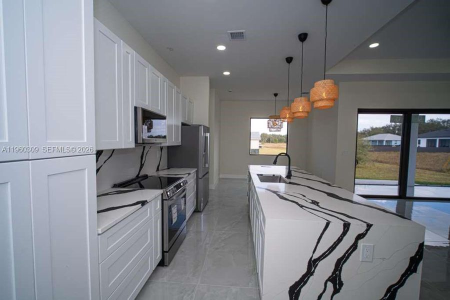 Furnished interior view inside a new home in , Lehigh Acres (Image 5).