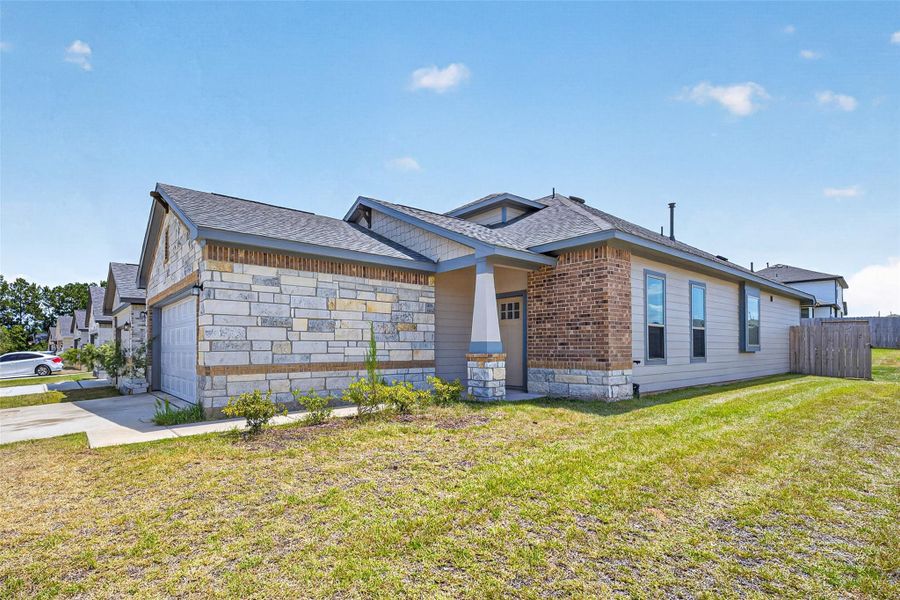 Front exterior of a new home in , Montgomery, TX, highlighting curb appeal (Image 25).