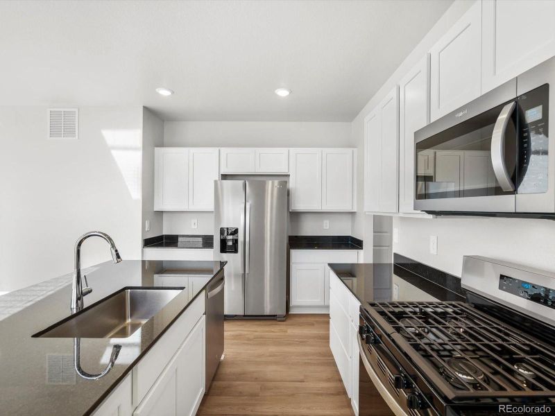 Furnished interior view inside a new home in Revere at Johnstown, Johnstown (Image 11).