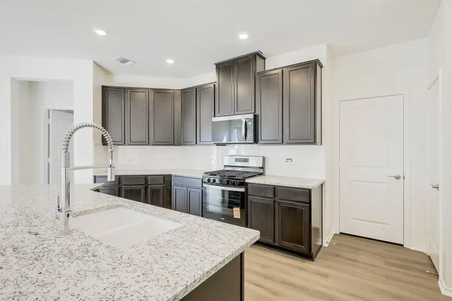 Furnished interior view inside a new home in Salerno - Heritage Collection, Round Rock (Image 7). Furnished interior view inside a new home in Salerno - Heritage Collection, Round Rock (Image 7).