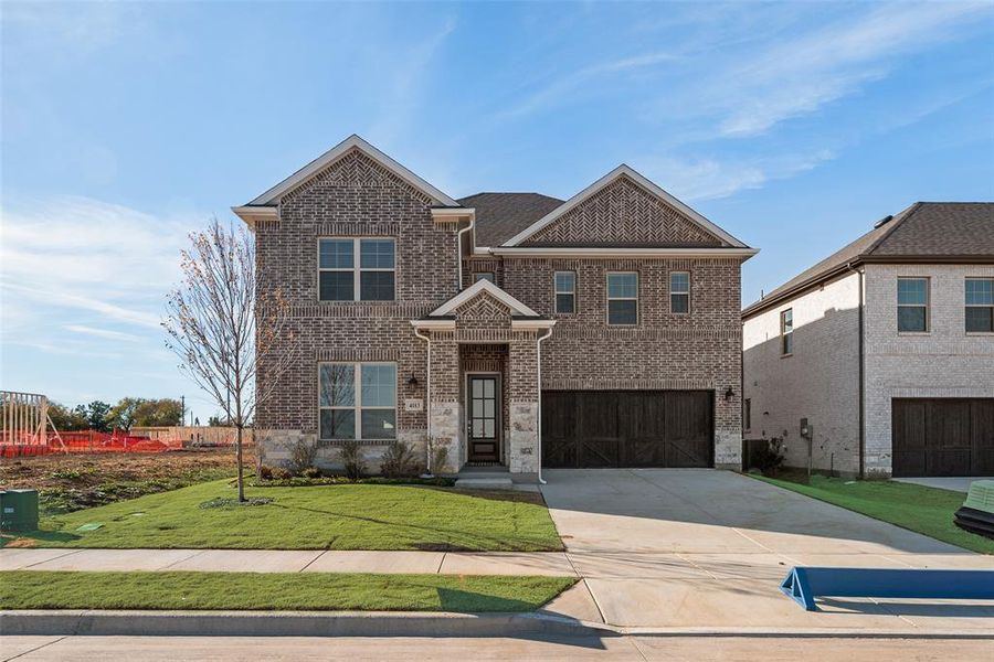 Front exterior of a new home in Sutton Fields, Celina, TX, highlighting curb appeal (Image 2). Front exterior of a new home in Sutton Fields, Celina, TX, highlighting curb appeal (Image 2).