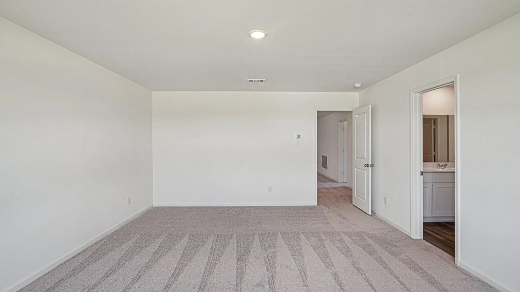 Representative unfurnished interior of a home built from the Pioneer by Starlight Homes in Avalon Ridge, Cut and Shoot (Image 21).