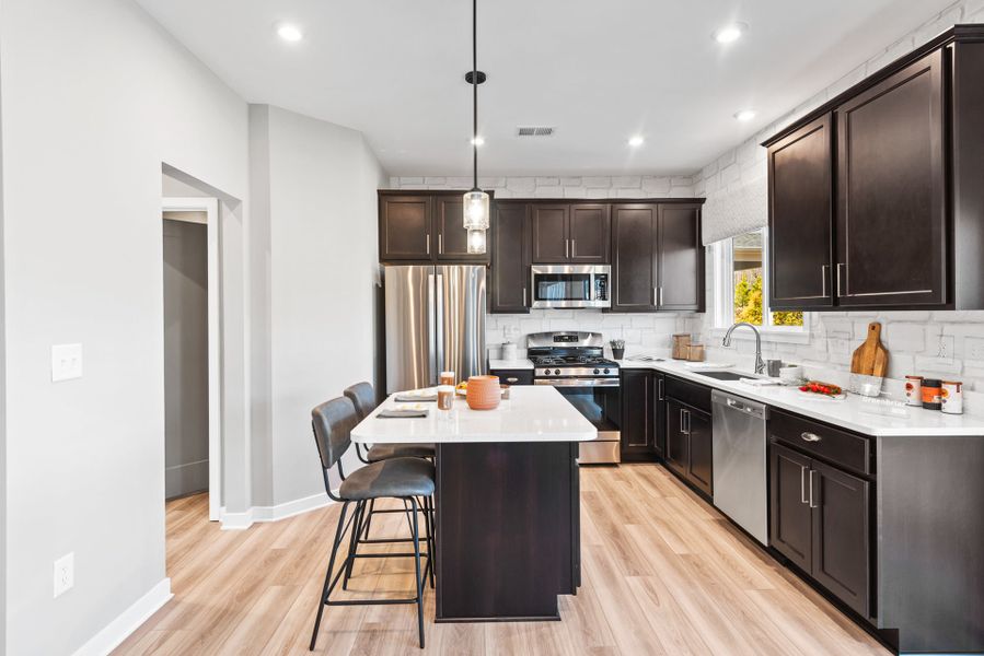 Representative furnished interior of a home built from the Greenbriar by Fischer Homes in Sage Woods, Dallas (Image 16).