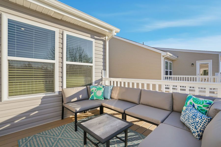Exterior details and patio area of a home in The Townes at Cheyney, Charlotte (Image 3). Exterior details and patio area of a home in The Townes at Cheyney, Charlotte (Image 3).