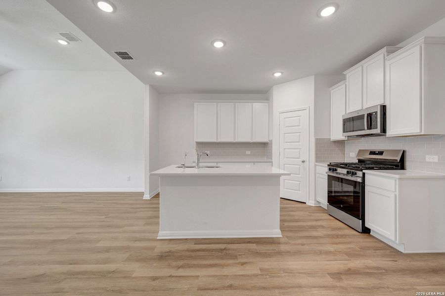 Furnished interior view inside a new home in Mesquite Ridge, San Antonio (Image 5).