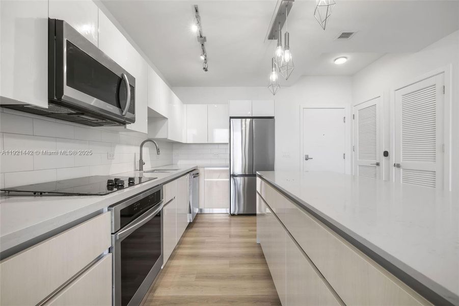 Furnished interior view inside a new home in , Hallandale Beach (Image 12).