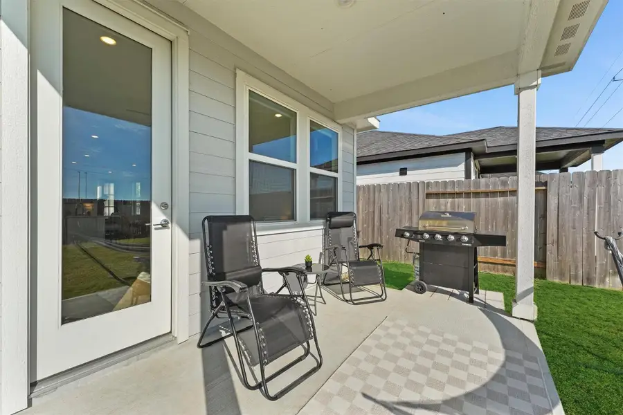 Exterior details and patio area of a home in Mason Woods 40s, Cypress (Image 3). Exterior details and patio area of a home in Mason Woods 40s, Cypress (Image 3).