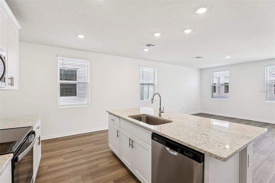 Furnished interior view inside a new home in The Meadow at Crossprairie Townes, St. Cloud (Image 5).