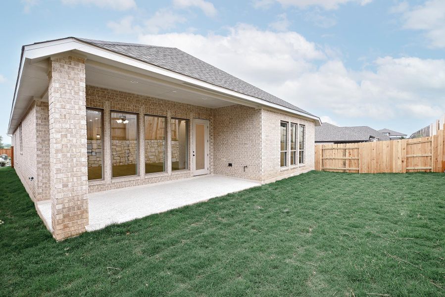 Exterior details and patio area of a home in Crosswinds, Kyle (Image 3).