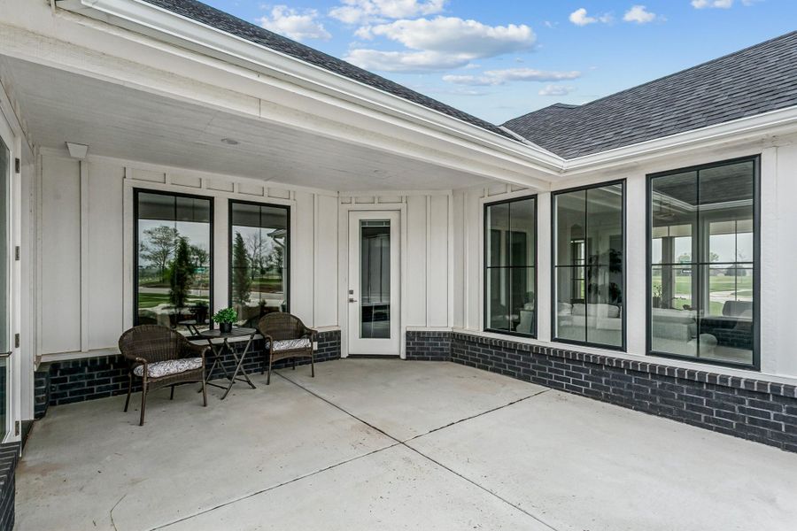 Exterior details and patio area of a home in The Courtyards at The Moorings, Wichita (Image 3).