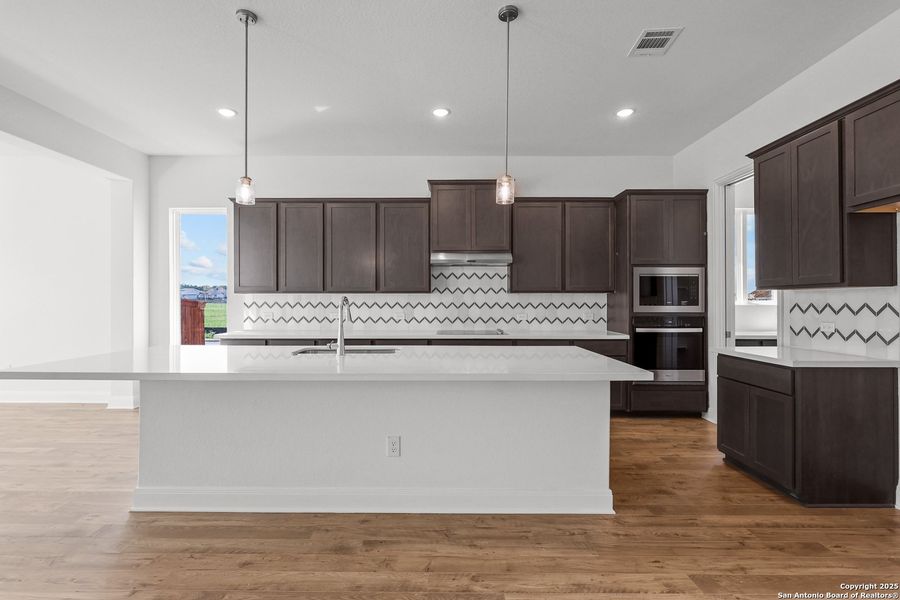 Furnished interior view inside a new home in Megan's Landing, Castroville (Image 11).