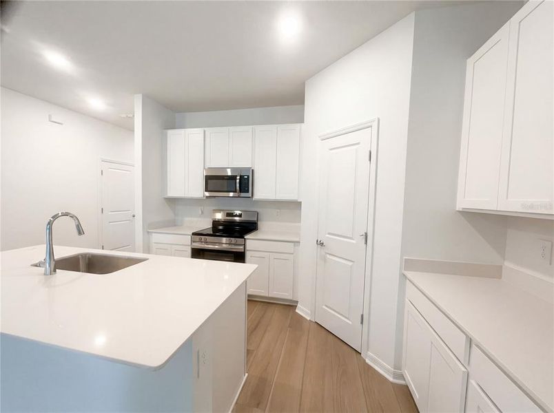 Furnished interior view inside a new home in Grand Park, Dunnellon (Image 10).