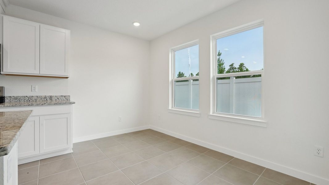 Kitchen of the Coronado - End at Cyrene at Harmony located in St Cloud FL by DRB Homes