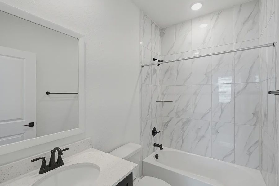 Representative furnished interior of a home built from the Athena by Chesmar Homes in Prominence Urban, San Antonio (Image 15).