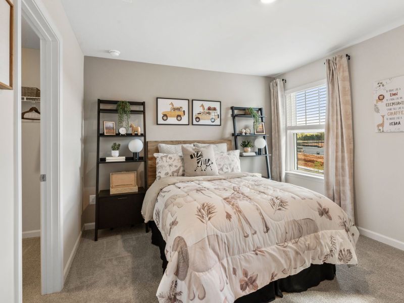 The secondary bedroom is the perfect guest space.