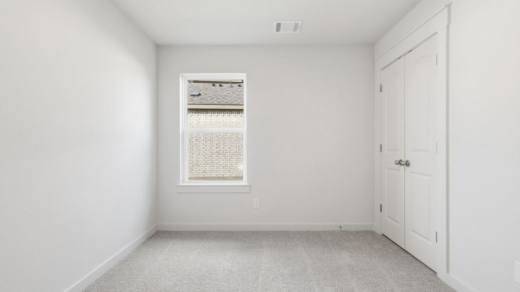 Furnished interior view inside a new home in Patriot Estates, Venus (Image 19).