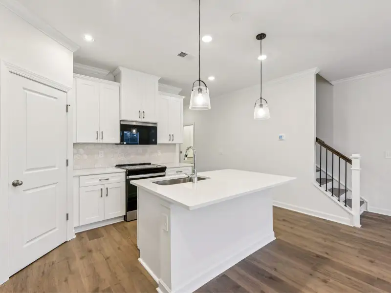 Furnished interior view inside a new home in Rocky River Towns, Charlotte (Image 3).