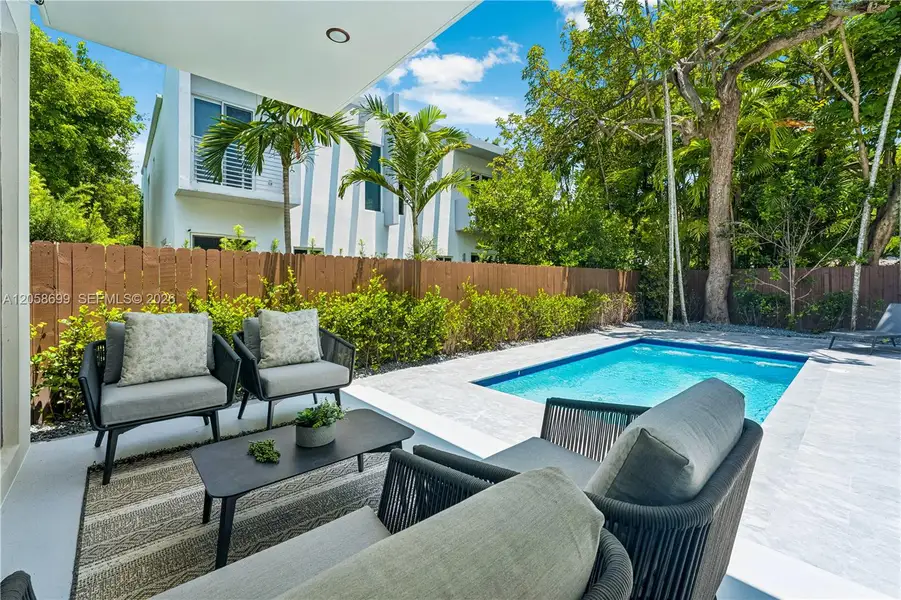 Exterior details and patio area of a home in , Miami (Image 3).