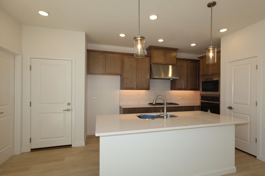Furnished interior view inside a new home in Revel Crossing at Wolf Ranch – The Ascent Collection, Colorado Springs (Image 4).