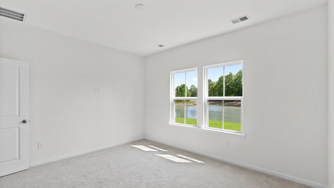 Representative furnished interior of a home built from the Boynton III by DRB Homes in Bluffs at Sun Colony, Longs (Image 14).