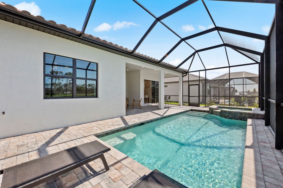 Screened-in pool with water views Screened-in pool with water views