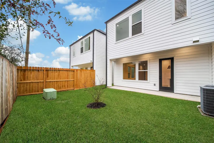 Exterior details and patio area of a home in , Houston (Image 4).