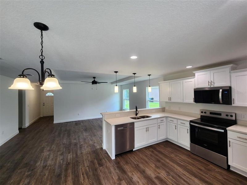 Furnished interior view inside a new home in , Dunnellon (Image 3).