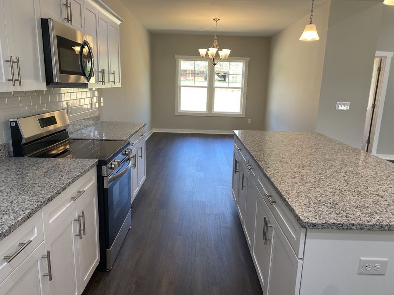 Representative furnished interior of a home built from the Pierce by Foundation Home Builders LLC in Old Hickory Crossing, Mocksville (Image 6).