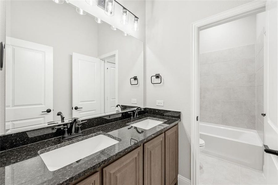 Furnished interior view inside a new home in Stone River Glen 60s, Royse City (Image 6).