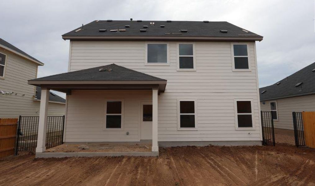 Front exterior of a new home in Cascades at Onion Creek, Austin, TX, highlighting curb appeal (Image 1). Front exterior of a new home in Cascades at Onion Creek, Austin, TX, highlighting curb appeal (Image 1).