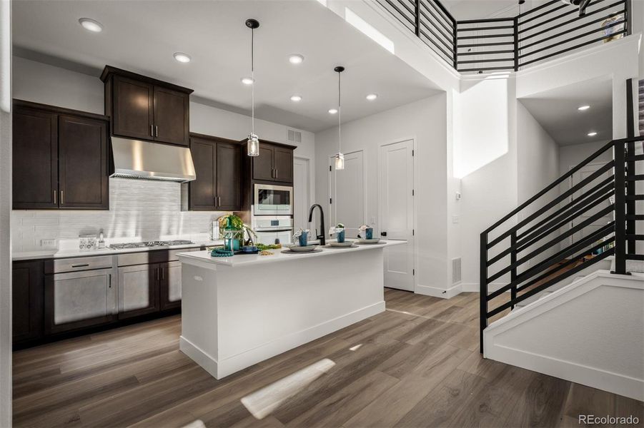 Furnished interior view inside a new home in Revel Crossing at Wolf Ranch - The Panorama Collection, Colorado Springs (Image 18).
