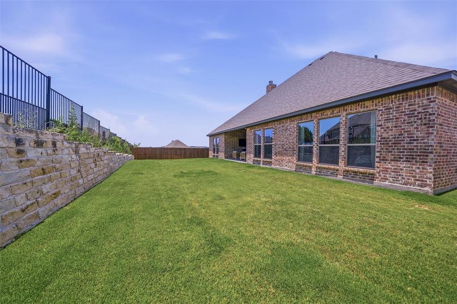Exterior details and patio area of a home in , Benbrook (Image 23). Exterior details and patio area of a home in , Benbrook (Image 23).