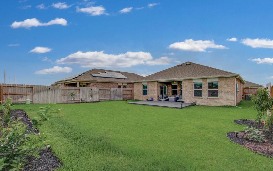 Exterior details and patio area of a home in Sunterra, Katy (Image 24). Exterior details and patio area of a home in Sunterra, Katy (Image 24).