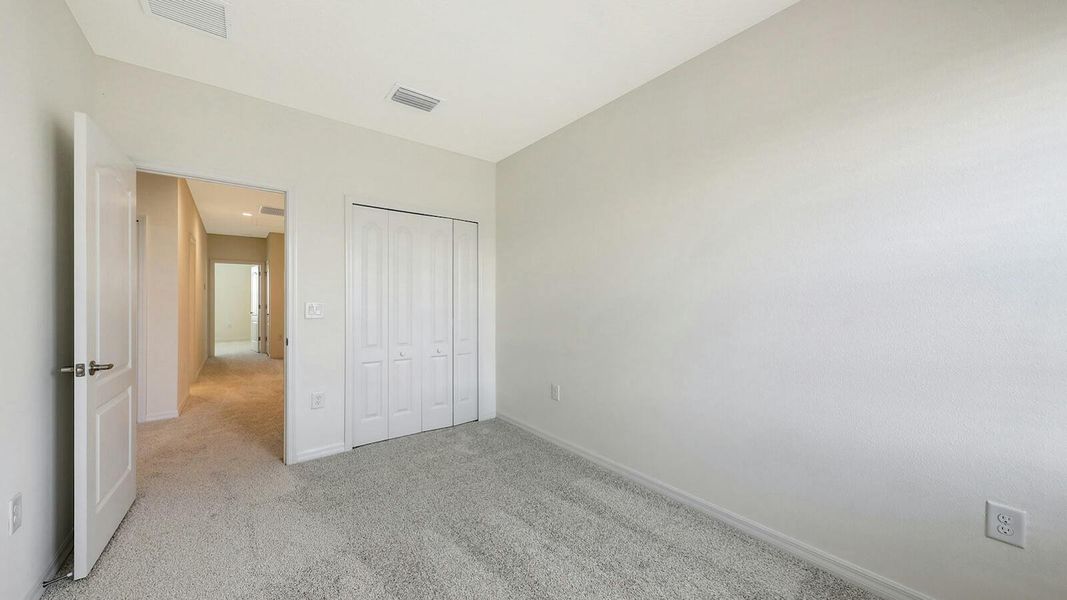 Spacious, unfurnished interior of a new home in Palm Grove Real Estate and Homes for Sale in Lakewood Ranch, FL - Neal Communities, Lakewood Ranch (Image 67).
