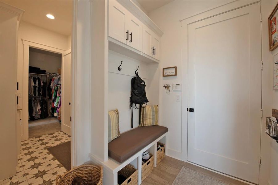Mudroom with recessed lighting