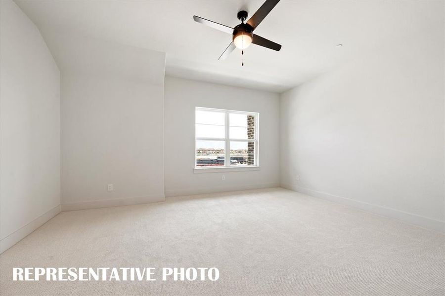 High ceilings, oversized windows, plush carpeting and a neutral color palette are waiting for you in this dreamy new owner's suite!  REPRESENTATIVE PHOTO