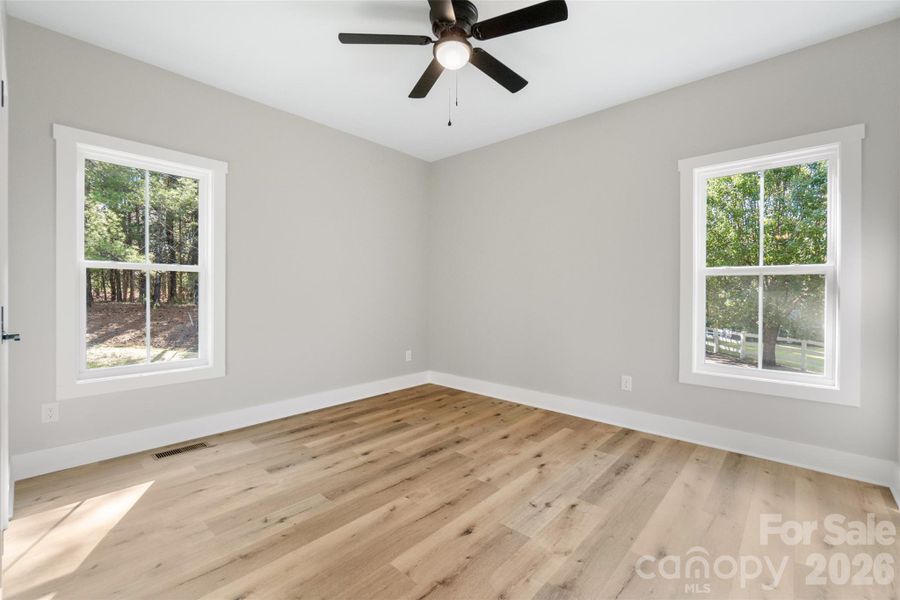 Spacious, unfurnished interior of a new home in , West End (Image 19).
