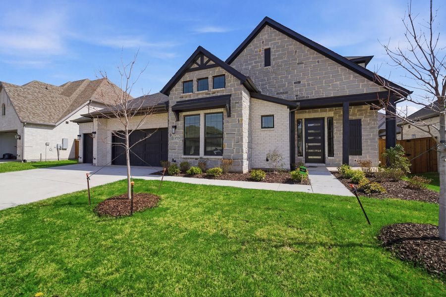 Front exterior of a new home in Sonoma Verde, Rockwall, TX, highlighting curb appeal (Image 28).